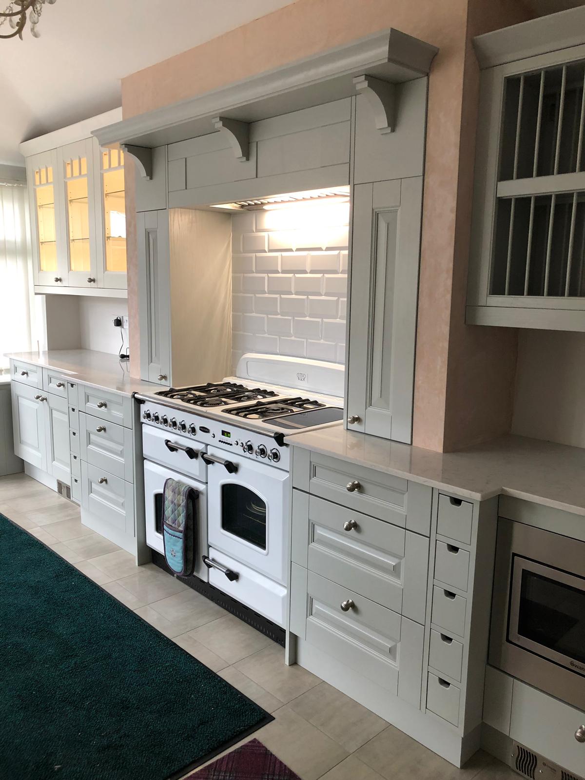 Fitted white kitchen, angled view