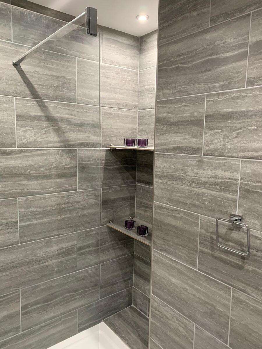 Contemporary style bathroom in grey