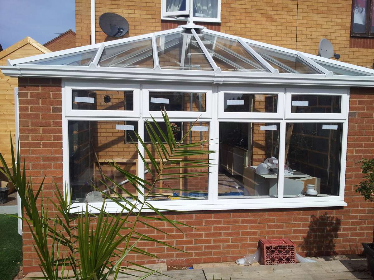 Brick conservatory with a glass roof